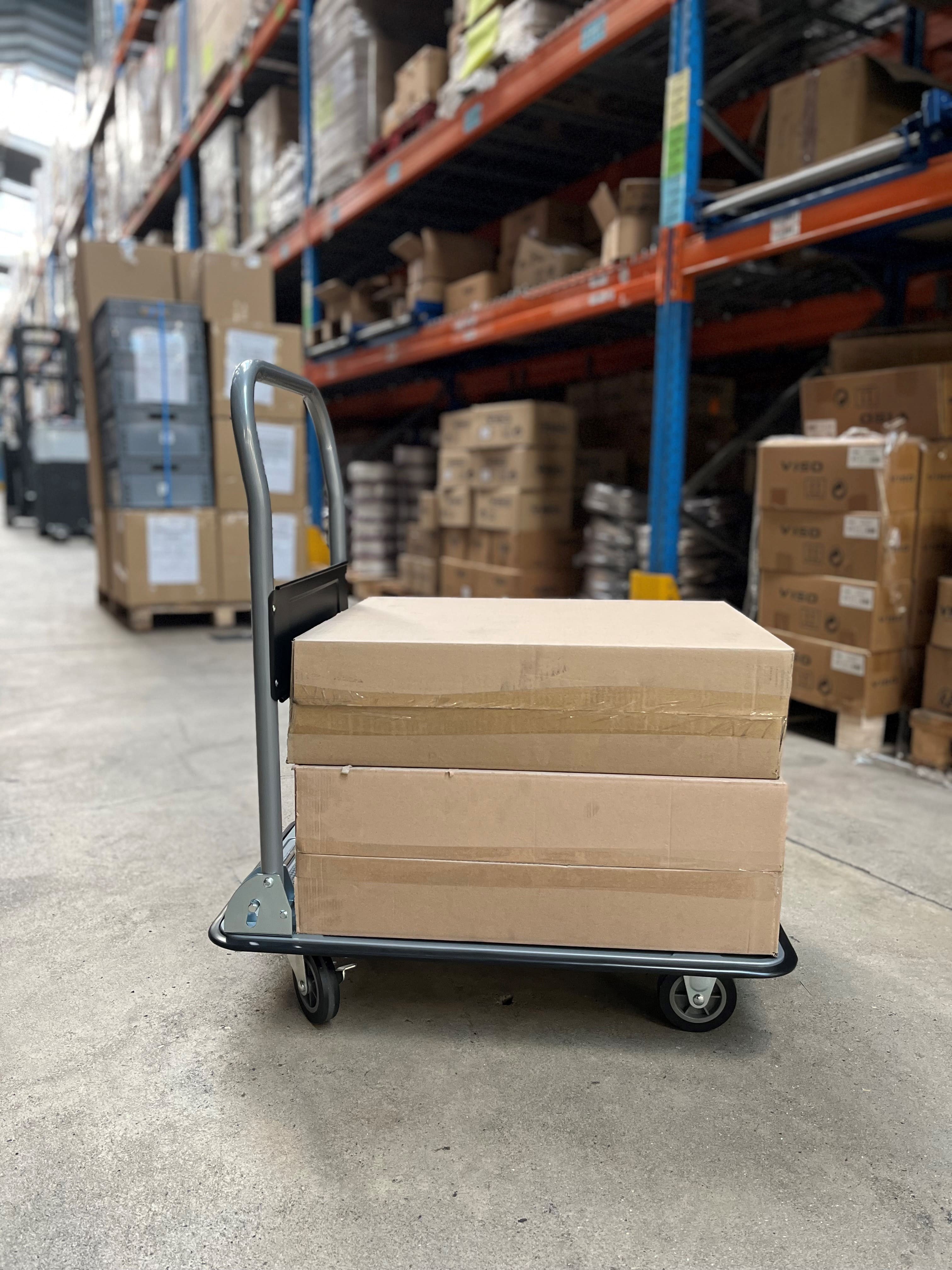 Professional trolley with foldable handle