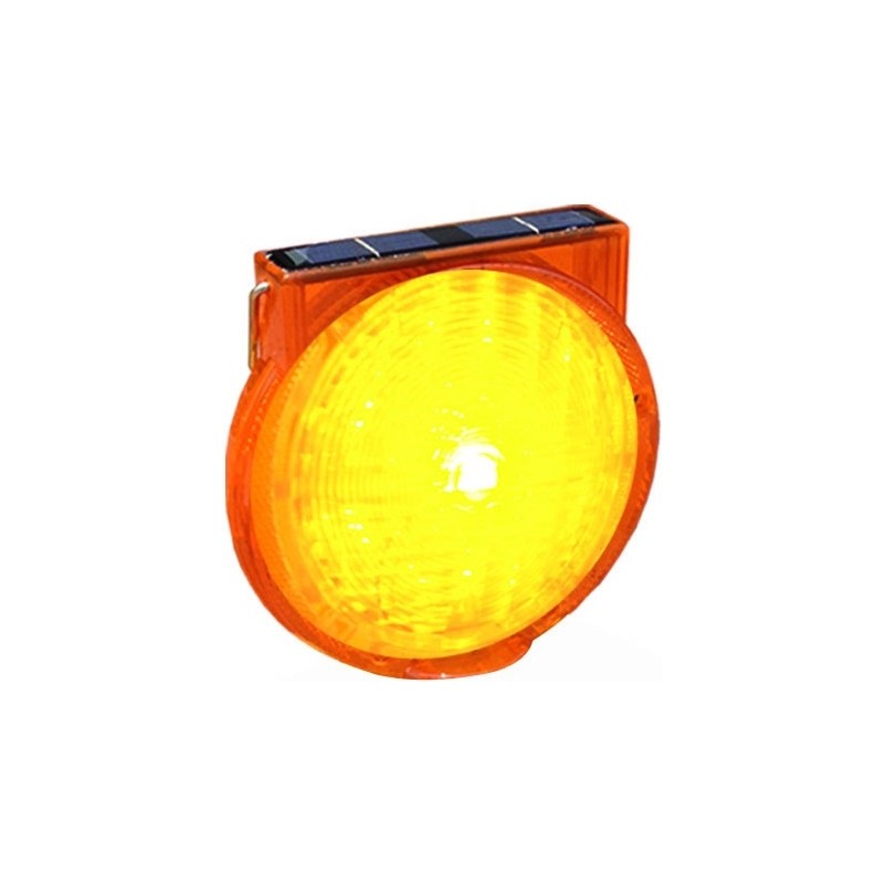 Solar-powered LED flashing construction lamp with interlocking feature